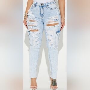 Distressed Light Wash Denim Skinny Jeans